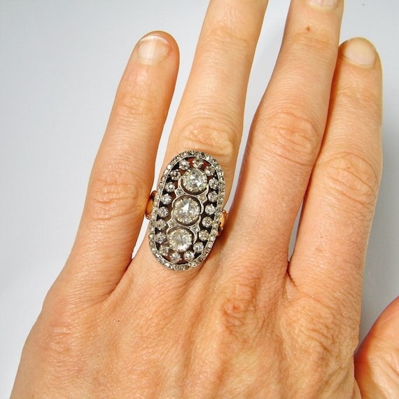 RARE AND FINE GEORGIAN DIAMOND RING, in high carat gold and silver. Set  with a fine old cut diamond