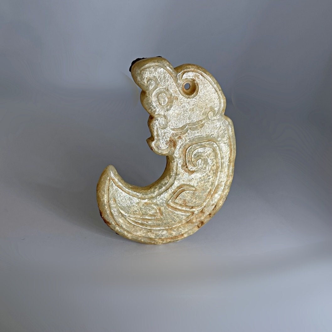 Western Zhou Dynasty Jade Dragon Pendant W. Authenticity Report