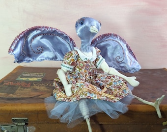 anthropomorphic handmade cloth blue bird art doll creature, fairy-tale embroidered and dressed in a sweet ruffled dress sale item