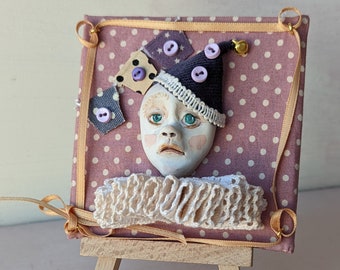 Circus clown art. Small plaque with 3D sculpted face of a clown. handmade one of a kind.