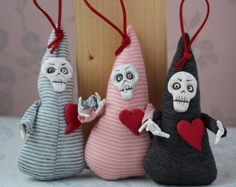 Cute Quirky Gothic Loving ghoul, hanging skull plushie with a heart prefect if you love Halloween