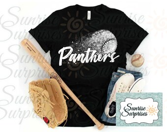May include: Black t-shirt with a baseball design and the word "Panthers" in white. A baseball bat, glove, baseball, jeans, and sneakers are arranged around the shirt. A "Sunrise Surprises" logo is in the bottom right corner.