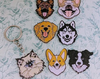 May include: A collection of dog-themed keychains featuring various breeds, including a German Shepherd, Corgi, Golden Retriever, and Husky. Each keychain showcases a detailed, colorful illustration of a dog's face, with a silver keyring attached.