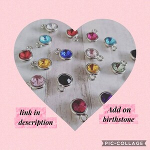 May include: Assortment of colourful crystal birthstone charms with silver settings. Add on birthstone. Link in description.