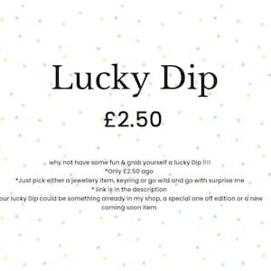 May include: A white background with colorful confetti and the text "Lucky Dip &pound;2.50". The text below reads "why not have some fun & grab yourself a lucky Dip!!!! *Only &pound;2.50 ago *Just pick either a jewellery item, keyring or go wild and go with surprise me *link is in the description Your lucky Dip could be something already in my shop, a special one off edition or a new coming soon item"