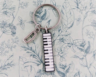 Sleutelhanger pianospeler, geschenken pianist, pianosleutelhanger, gepersonaliseerde pianistcadeaus, muzikantcadeau, muziekgeïnspireerd, muzikaal geïnspireerd,