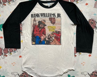 Vintage 80’s Hank Williams Jr. Bama Band Strong Stuff Raglan T shirt, size Small 1983 Outlaw Country