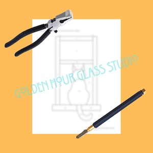 May include: An image featuring glass working tools. A pair of black-handled pliers with silver jaws and a dark blue handled glass cutter with a gold tip are positioned around a white sheet with a cat drawing. The background is orange.