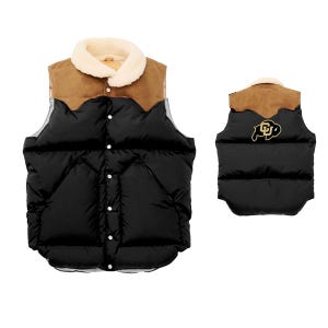 May include: Black puffer vest with a brown suede yoke and a cream-colored faux fur collar. The vest has a button-up front and a logo on the back. The vest is shown from the front and back.