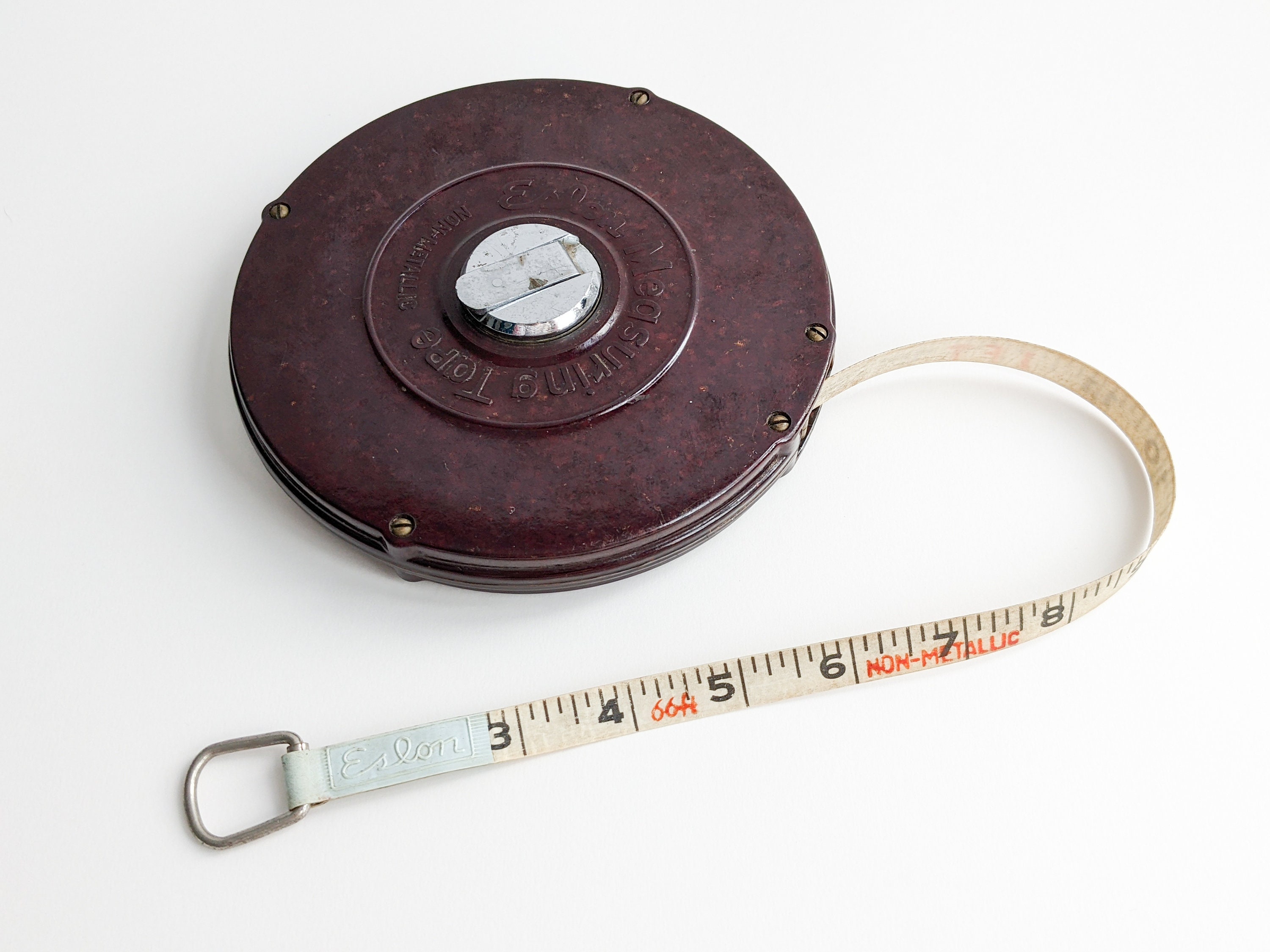 Fabric Measuring Tape in a Bakelite Frame. - Gilai Collectibles