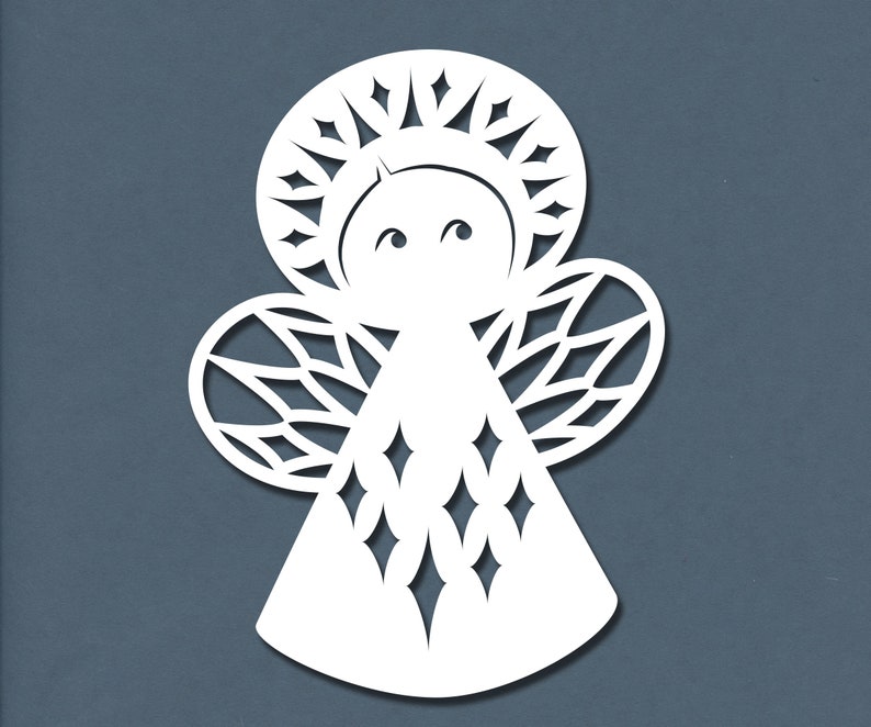 May include: White paper cut-out of an angel with a halo, wings, and a star-shaped pattern.