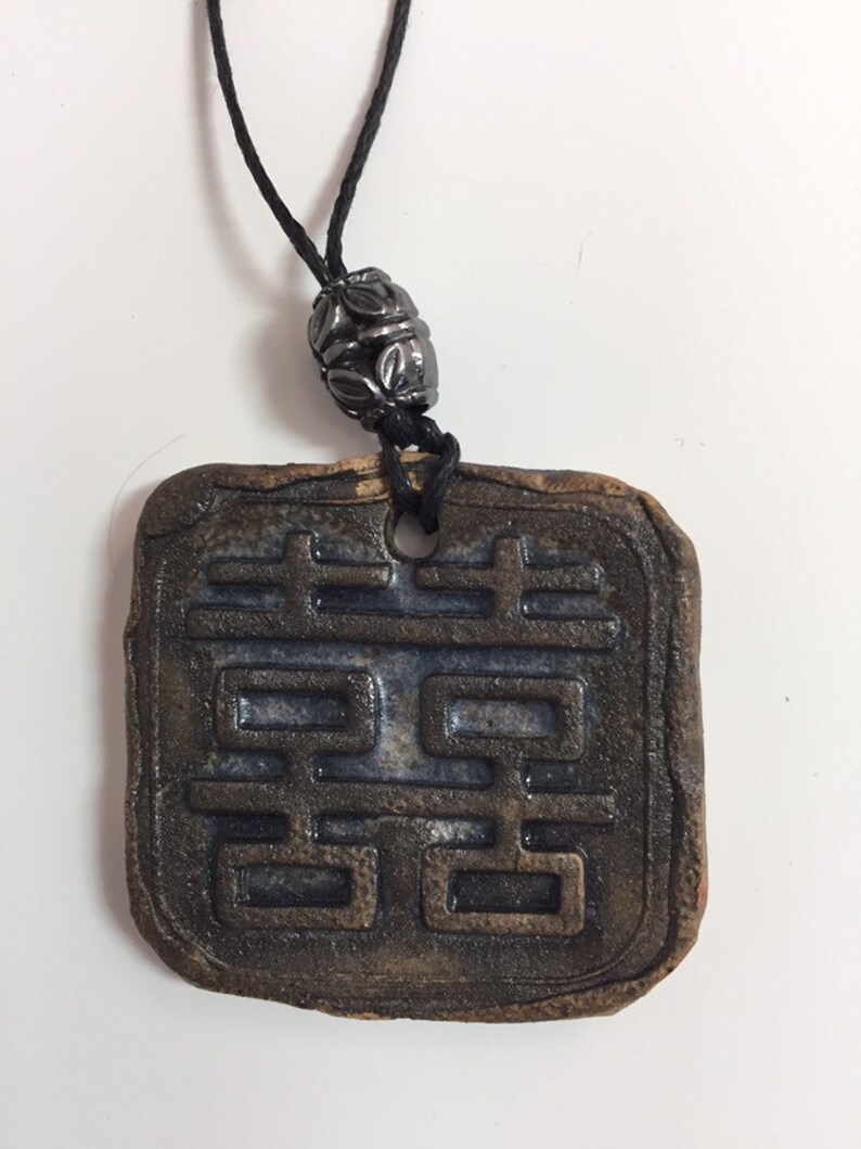 handmade ceramic pendant