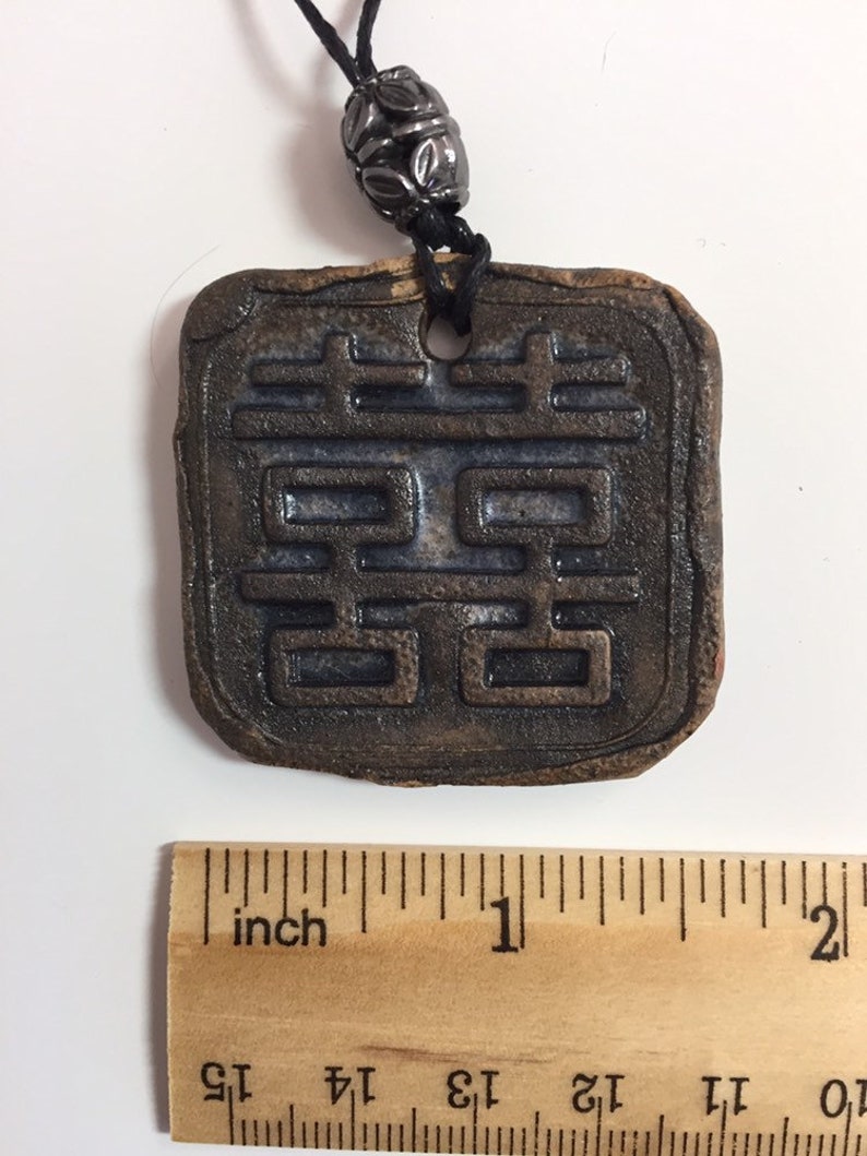 handmade ceramic pendant