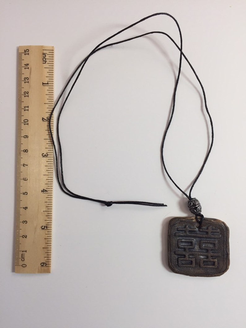handmade ceramic pendant