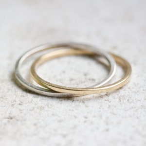 Interlocked rings made of sterling silver and 9k gold