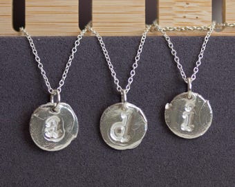 Initial necklace with a typewriter font initial, fine silver, lowercase