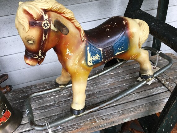 children's play riding horse