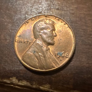 1968 D Lincoln Penny with Error on Top Rim, and &quot;L&quot; in Liberty on Edge.