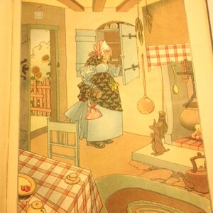 May include: An illustration of a woman in a blue and white dress standing in a kitchen. She is looking into a cabinet. There is a dog in the background. The text "Old Mother Hubbard" is at the bottom of the image.