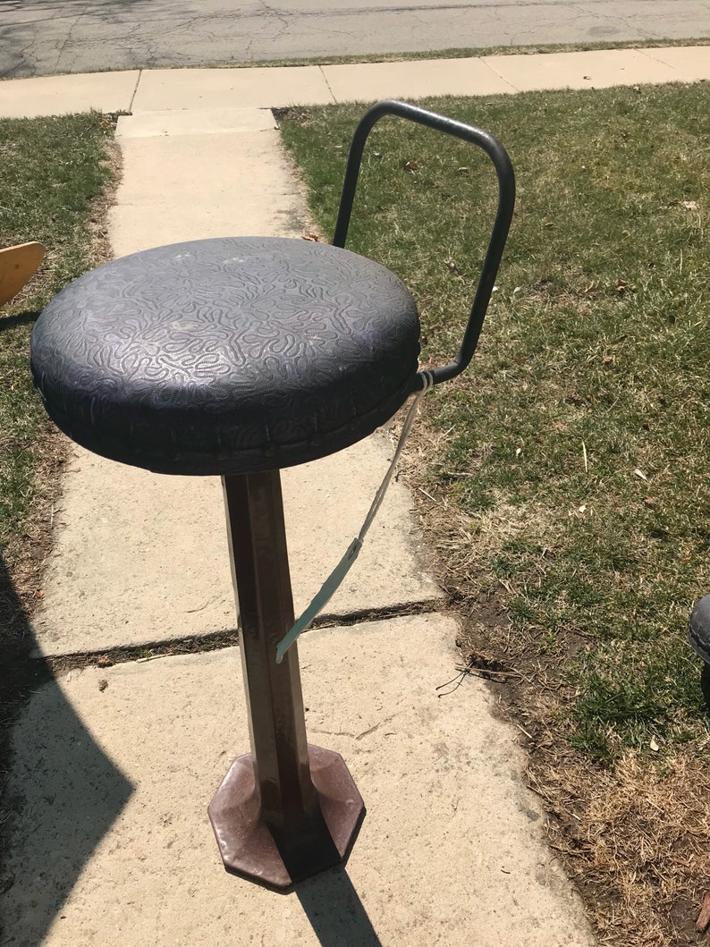 Vintage Diner/Soda Fountain Cast Iron Bar Stool listing is Etsy