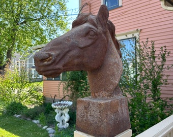 Vintage cast iron horse head statue features scrupulous detail and a natural rusted finish, listing is for one only but I have two