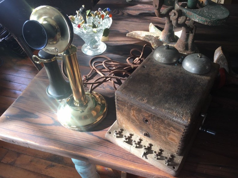 1904 With Ringer Box Here is an original Antique Brass American Telephone and Telegraph Candlestick Original Telephone