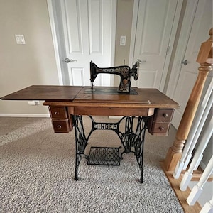 Singer Mfg Co Sewing Machine, table and stand, very solid, Great old time look, Just like grandma used, see shipping info in desc image 1