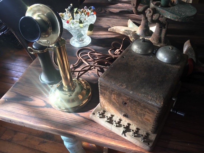 1904 With Ringer Box Here is an original Antique Brass American Telephone and Telegraph Candlestick Original Telephone