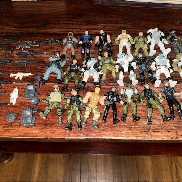 Vintage Lot Of Army Action Figures with weapons