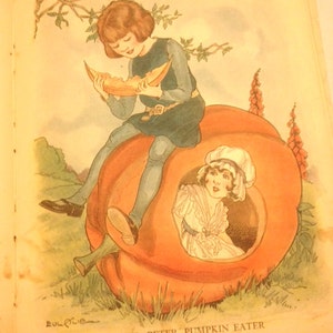 May include: An illustration of two children sitting inside a large orange pumpkin. The child on the left is wearing a blue dress and holding a slice of pumpkin. The child on the right is wearing a white dress and has their hair pulled back. The text "PETER, PETER, PUMPKIN EATER" is written below the pumpkin.