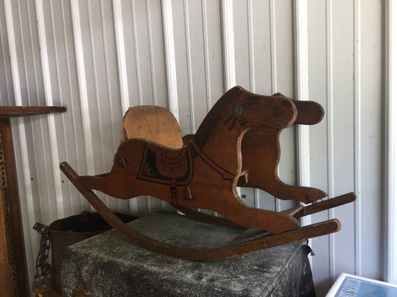 children's play riding horse