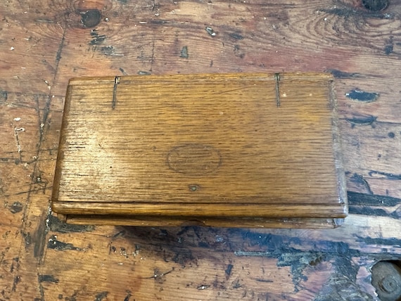Antique Singer Puzzle Box Assorted Attachments and Bobbin