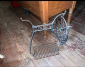 Antique Singer Mfg Co. Sewing Machine Cast Iron mid section of Base only, includes treadle peddle wheel and gaurd