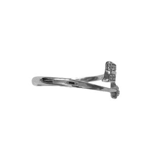 May include: A silver-colored ring with a unique design. The ring features a twisted band that leads to a decorative element with a textured pattern. The ring is shown against a white background.