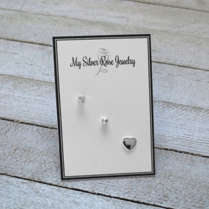 925 Sterling Silver 3 piece Stud Set, 1 piece each of a 3mm Ball Stud, 3mm CZ Stud and Heart Stud, Great for Cartilage Piercings. Boxed.