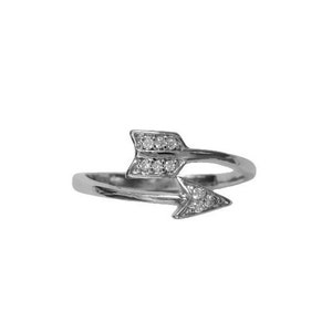 May include: A silver-toned ring featuring an arrow design. The arrowheads are embellished with small, clear gemstones. The ring has a delicate, open design, with the arrowheads pointing in opposite directions. The ring is set against a white background.