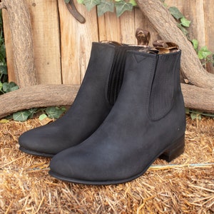 Botines charros negros top