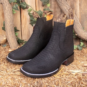 Snakeskin booties size 12 Clearance