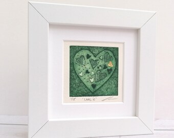 Love Is, small framed original green heart collagraph print with gold embellishments