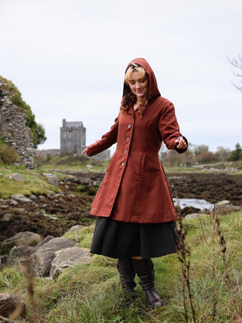 Discover our Rusty Red Midi Wool Coat for woman. Upgrade your wardrobe with this felted Wool midi Coat in a timeless style.