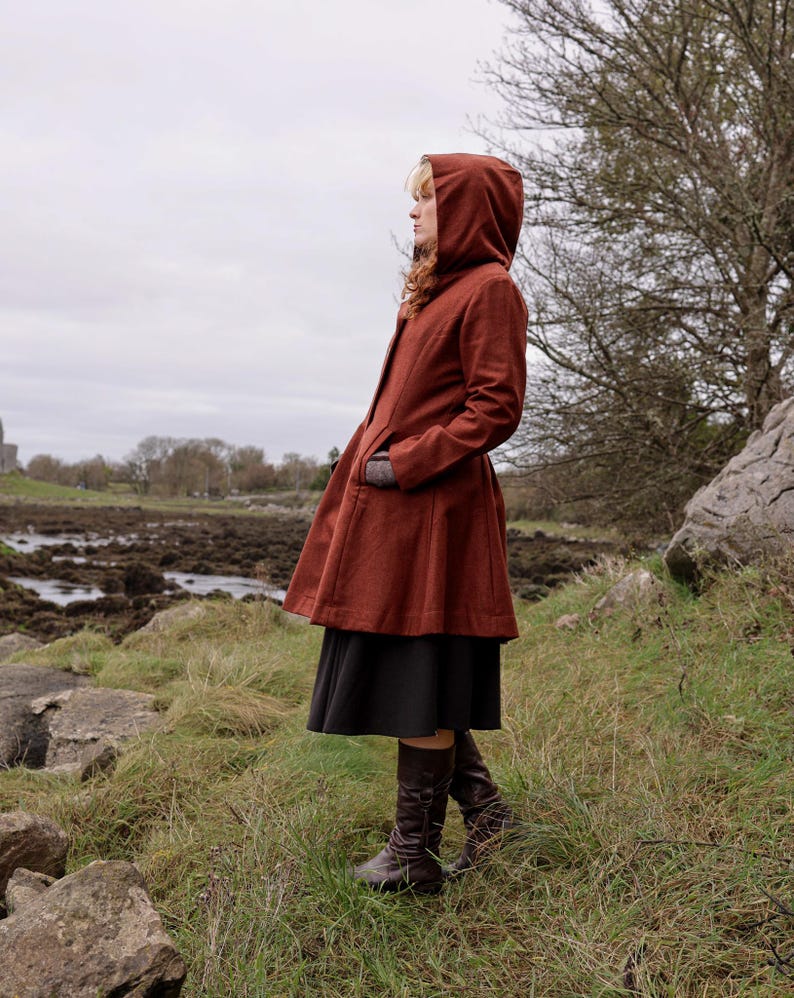 Discover our Rusty Red Midi Wool Coat for woman. Upgrade your wardrobe with this felted Wool midi Coat in a timeless style.
