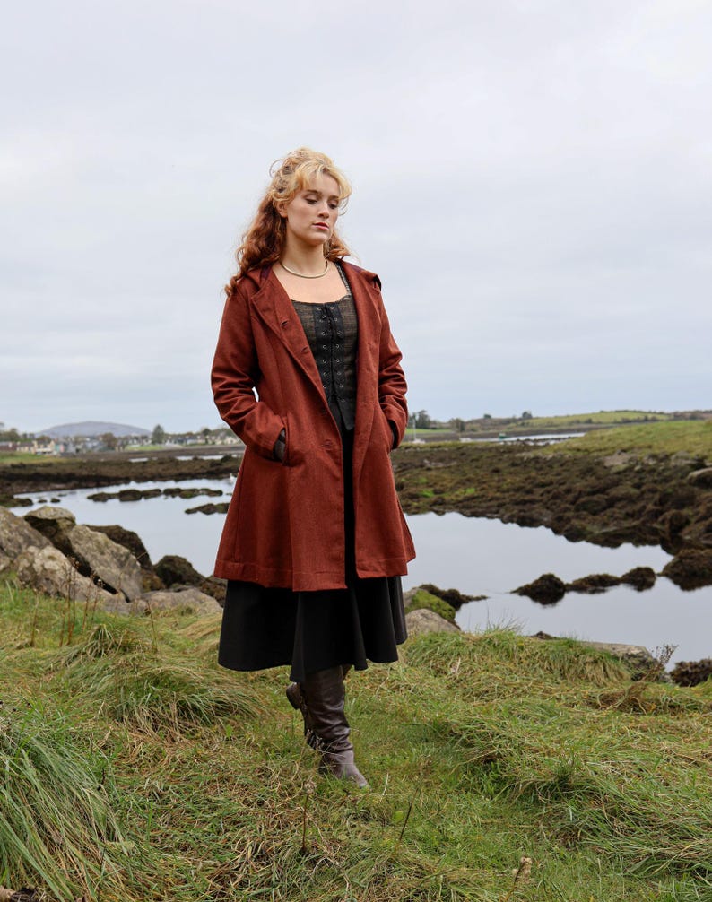 Discover our Rusty Red Midi Wool Coat for woman. Upgrade your wardrobe with this felted Wool midi Coat in a timeless style.