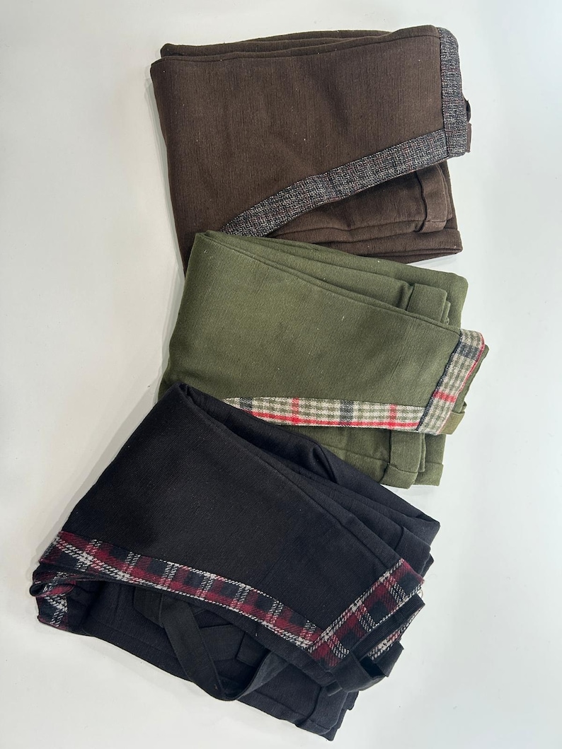 Discover our Meadow Dungarees, an earthy colours jumpsuit trimmed with oak tweed, designed for folklore-inspired style, comfort, and everyday wear.