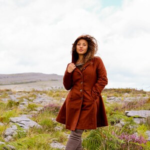 Upgrade your fall wardrobe with our Rusty Red Wool Coat, a perfect fall coat for style and warmth. Discover our ladies wool jackets, coats, and wool coats for women.