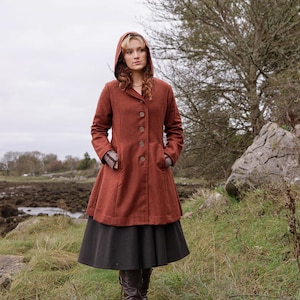 Discover our Rusty Red Midi Wool Coat for woman. Upgrade your wardrobe with this felted Wool midi Coat in a timeless style.