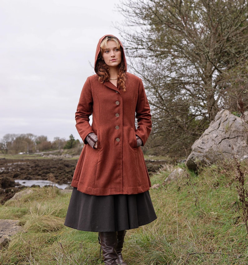 Discover our Rusty Red Midi Wool Coat for woman. Upgrade your wardrobe with this felted Wool midi Coat in a timeless style.