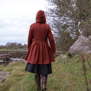 Discover our Rusty Red Midi Wool Coat for woman. Upgrade your wardrobe with this felted Wool midi Coat in a timeless style.