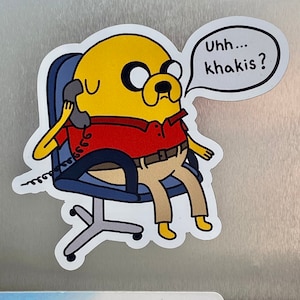 May include: A yellow cartoon dog wearing a red shirt and khaki pants sits in a blue office chair and talks on a rotary phone. A speech bubble above the dog says "Uhh... khakis?"