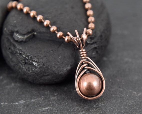 Copper Bead Wire Wrapped Beaded Copper Drop Necklace on a Copper