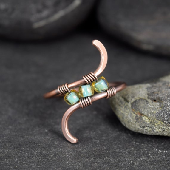 Wire Wrapped Copper Ring Made With Shiny Blue yellow Seed Glass